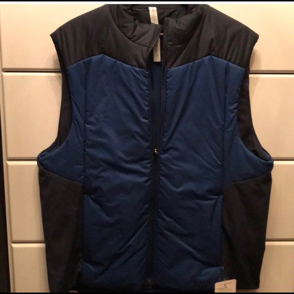 Lululemon Vest with tags. Fits like a XL